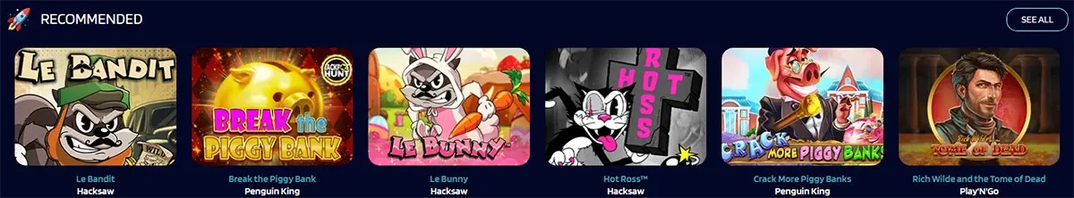 Recommended casino games row featuring colorful slot thumbnails including Le Bandit, Break the Piggy Bank, Le Bunny, Hot Ross, Crack More Piggy Banks, and Rich Wilde and the Tome of Dead on a dark blue interface.
