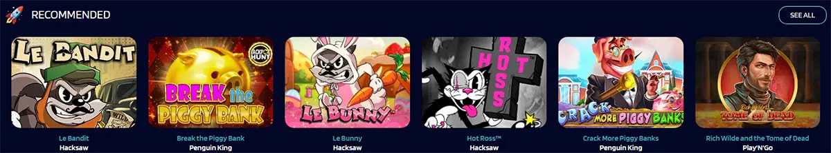 Recommended casino games row featuring colorful slot thumbnails including Le Bandit, Break the Piggy Bank, Le Bunny, Hot Ross, Crack More Piggy Banks, and Rich Wilde and the Tome of Dead on a dark blue interface.